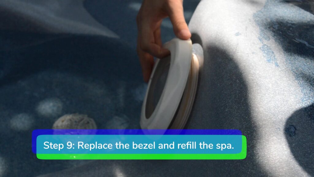 Step 9. Replace the bezel and refill the spa-