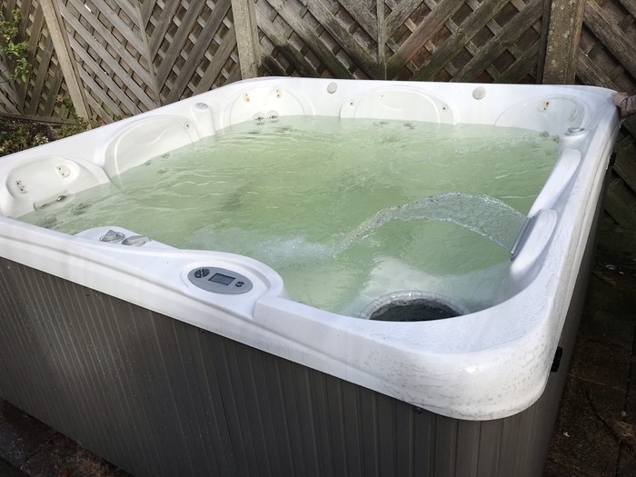 hot tub green yellow tinge-